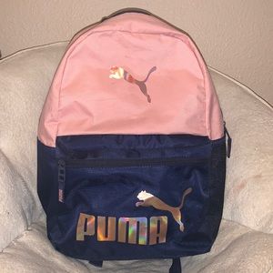 Pink,navy blue puma backpack